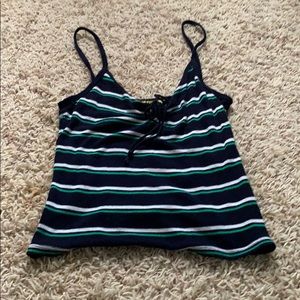 A green, blue, and white cami crop